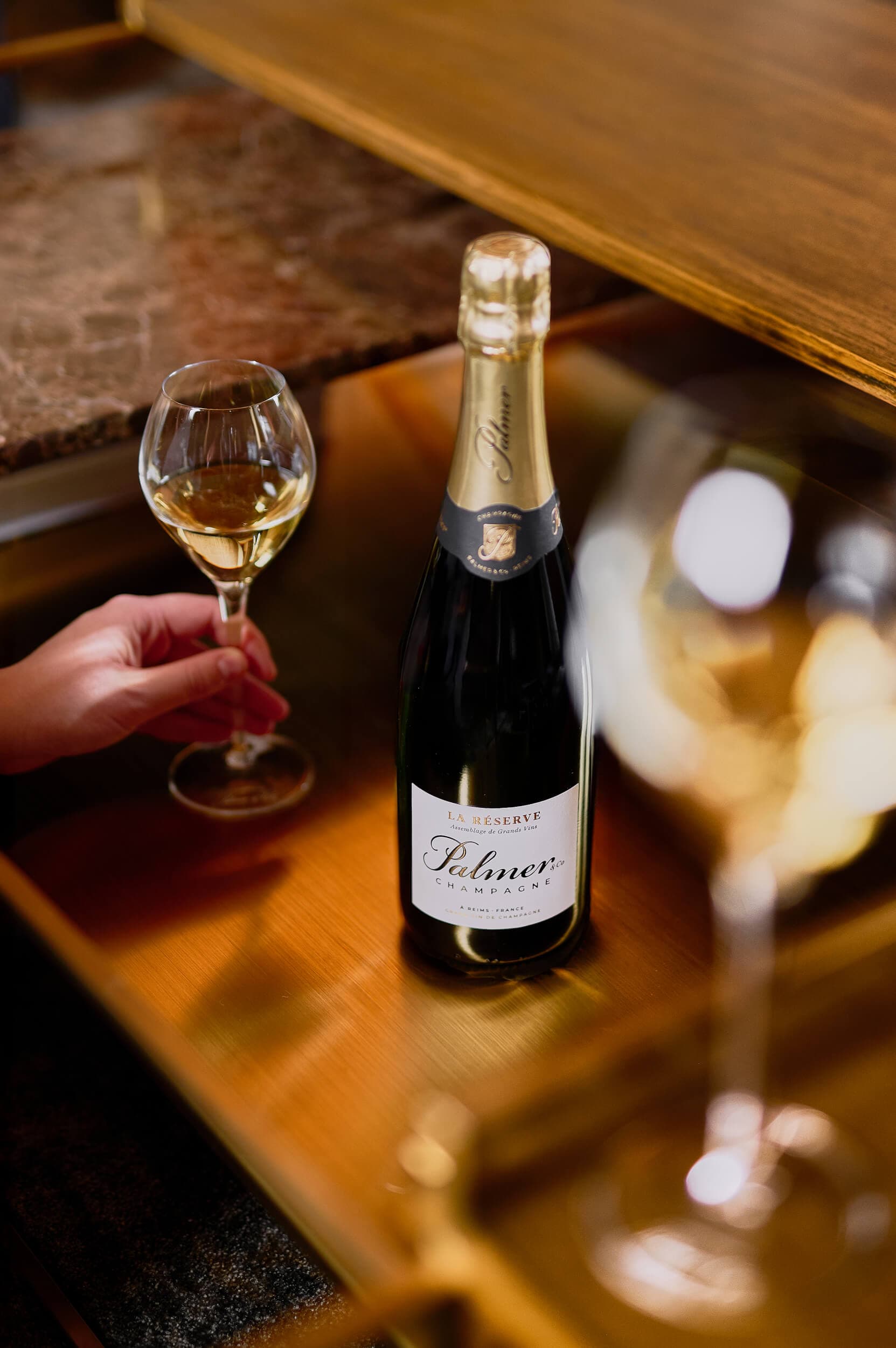 Bouteille de Champagne Palmer & Co La Réserve, cuvée emblématique de la Maison Palmer & Co.