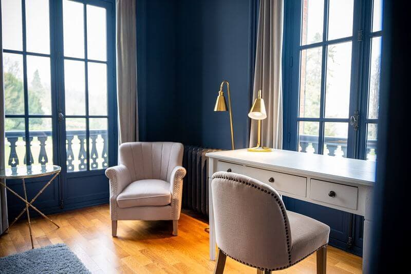 Suite élégante du Domaine du Chalet à Chigny-les-Roses, hébergement d'exception au cœur du vignoble de Champagne.