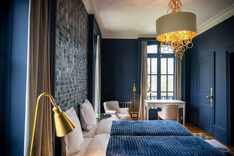 Suite élégante du Domaine du Chalet à Chigny-les-Roses, hébergement d'exception au cœur du vignoble de Champagne.